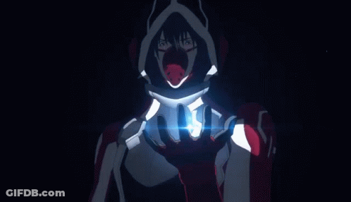 A Man Wearing A Mask And A Hood With Wings Is Standing In Front Of A Feathered Background . GIF