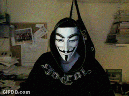 A Man Wearing A Mask And A Hoodie That Says Social On It GIF