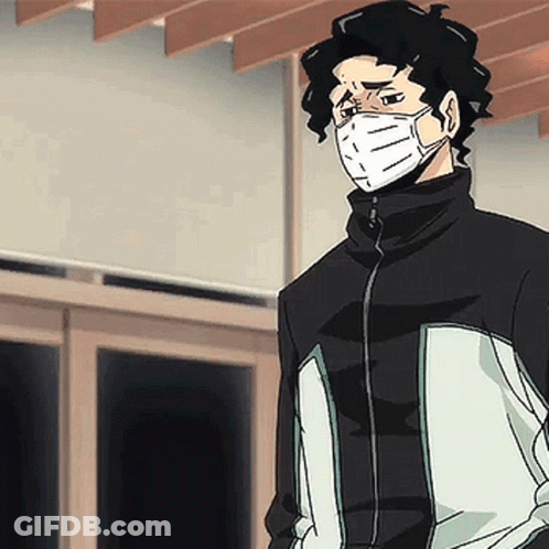 A Man Wearing A Mask And A Jacket Is Standing In Front Of A Window . GIF