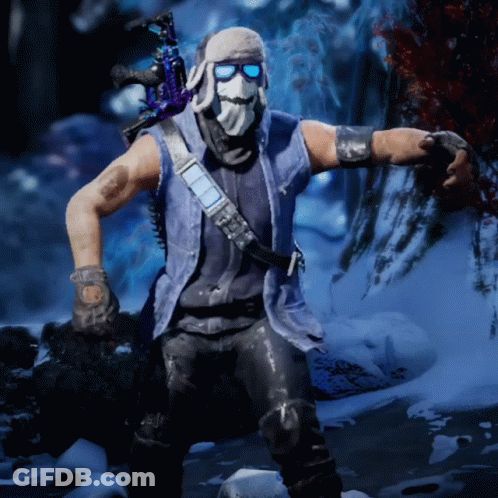 A Man Wearing A Mask And Sunglasses Stands In A Snowy Area GIF