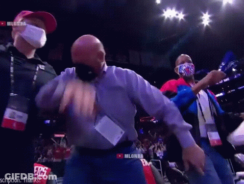 A Man Wearing A Mask Is Dancing In A Stadium With A Youtube Logo On The Bottom Right GIF