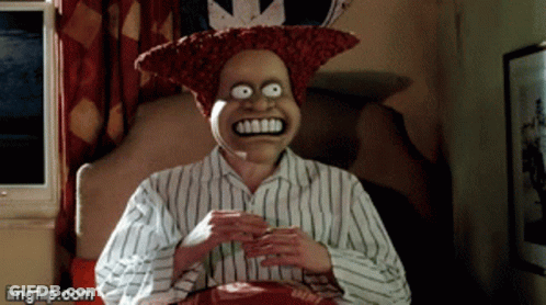 A Man Wearing A Mask Is Sitting On A Bed With Imgflip.com At The Bottom Of The Image GIF