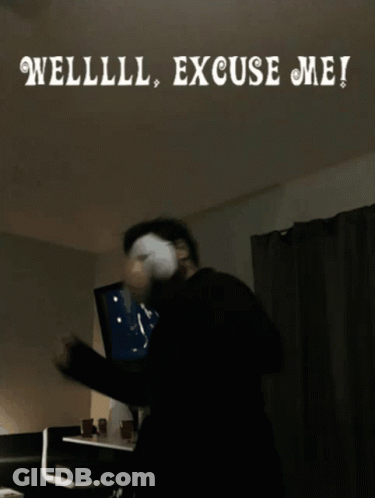 A Man Wearing A Mask Is Standing In Front Of A Sign That Says Welllll Excuse Me ! GIF