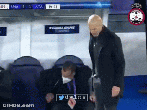 A Man Wearing A Mask Stands Next To Another Man In A Locker Room With A Sign That Says #Equalgame GIF