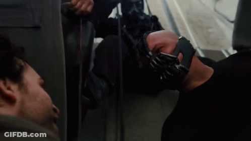 A Man Wearing A Mask With The Words The Fire Rises On The Bottom GIF