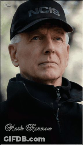 A Man Wearing A Ncis Hat And A Jacket GIF