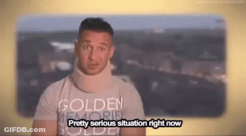 A Man Wearing A Neck Brace And A T-Shirt That Says Golden Memories Is Talking . GIF
