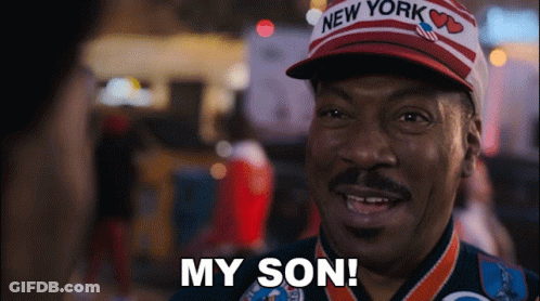A Man Wearing A New York Hat And A Medal Says My Son GIF