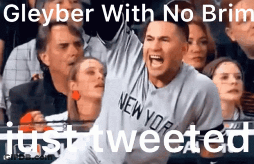A Man Wearing A New York Jersey Is Screaming In The Crowd GIF