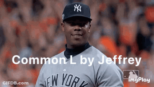A Man Wearing A New York Yankees Baseball Uniform GIF