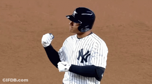 A Man Wearing A New York Yankees Baseball Uniform GIF