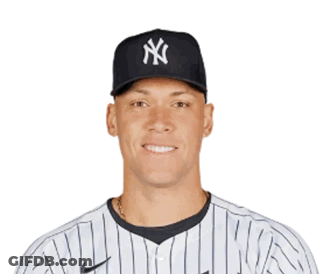 A Man Wearing A New York Yankees Hat And A Nike Jersey GIF