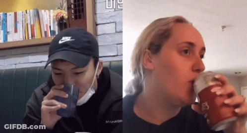 A Man Wearing A Nike Hat And A Woman Drinking From A Can GIF