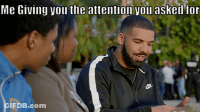 A Man Wearing A Nike Jacket Is Talking To Two Other People GIF