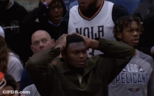 A Man Wearing A No Jersey Holds His Hair GIF