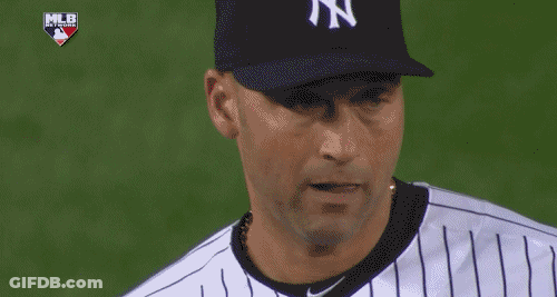A Man Wearing A Ny Yankees Hat Adjusts His Hat GIF