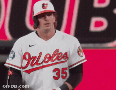 A Man Wearing A Orioles Jersey With The Number 35 GIF
