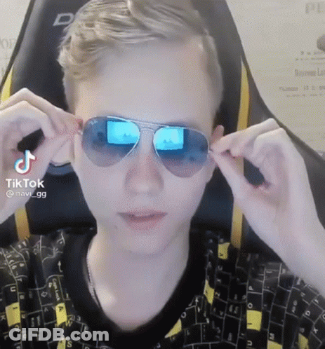 A Man Wearing A Pair Of Sunglasses With A Tiktok Watermark On It GIF