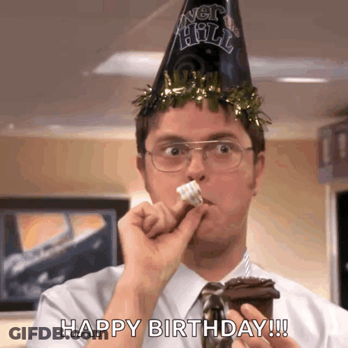 Man In Party Hat Eating Cake Saying Happy Birthday GIF
