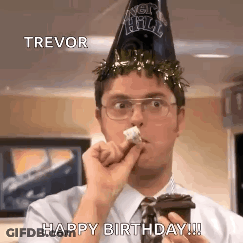 A Man Wearing A Party Hat Is Eating A Piece Of Cake While Holding A Cup Of Coffee . GIF