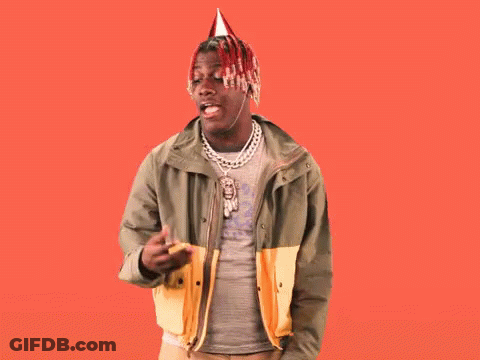 A Man Wearing A Party Hat Stands In Front Of A Red Background That Says Birthday GIF