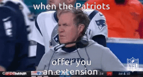 A Man Wearing A Patriots Jersey Is Sitting In The Stands GIF
