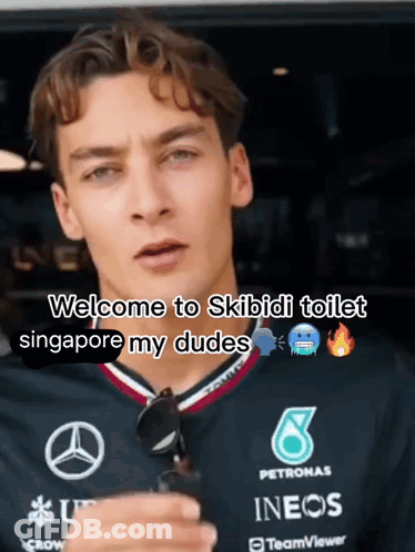 A Man Wearing A Petronas Shirt Says Welcome To Skibidi Toilet GIF