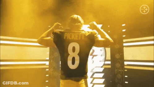 A Man Wearing A Pickett Jersey With The Number 8 GIF