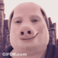 A Man Wearing A Pig Mask Smiles In Front Of A Building GIF