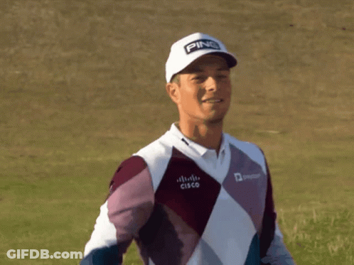 A Man Wearing A Ping Hat And Cisco Shirt GIF