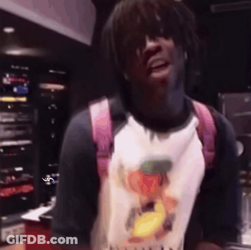 A Man Wearing A Pink Backpack And A T-Shirt With A Duck On It GIF