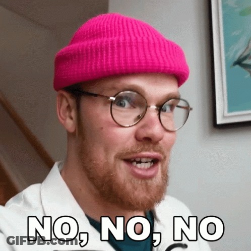 A Man Wearing A Pink Beanie And Glasses Says No GIF