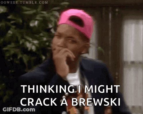 A Man Wearing A Pink Hat And A Black Jacket Is Thinking I Might Crack A Brewski GIF