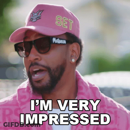 A Man Wearing A Pink Hat And Sunglasses Is Saying I 'M Very Impressed GIF