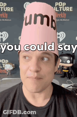 A Man Wearing A Pink Hat That Says " You Could Say " On It GIF