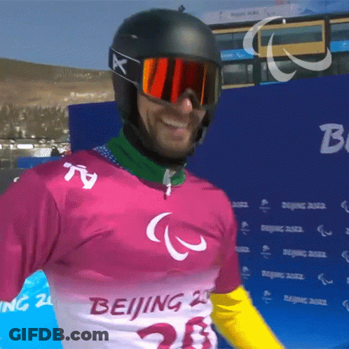 A Man Wearing A Pink Shirt That Says Beijing GIF