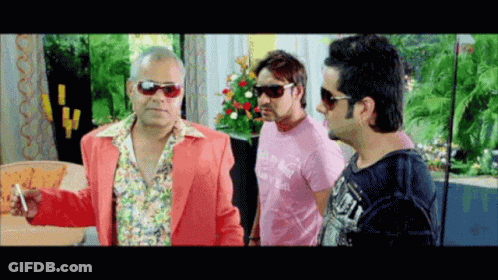 A Man Wearing A Pink Shirt That Says Lonely GIF