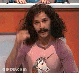 A Man Wearing A Pink Shirt With A Unicorn On It GIF