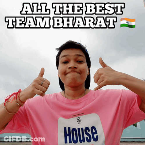 A Man Wearing A Pink Shirt With The Word House On It GIF