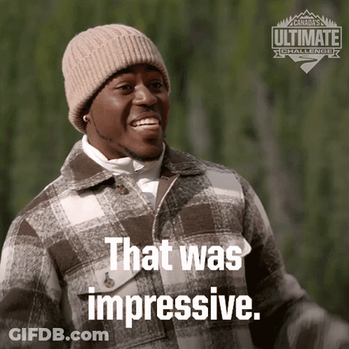 A Man Wearing A Plaid Jacket And A Hat Says That Was Impressive GIF