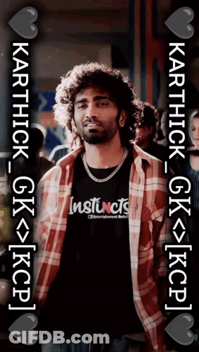 A Man Wearing A Plaid Shirt And A Black Shirt With Instincts On It GIF