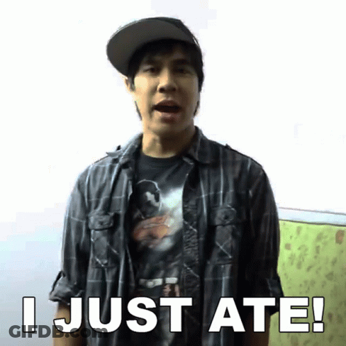 A Man Wearing A Plaid Shirt And A Hat Says " I Just Ate " GIF