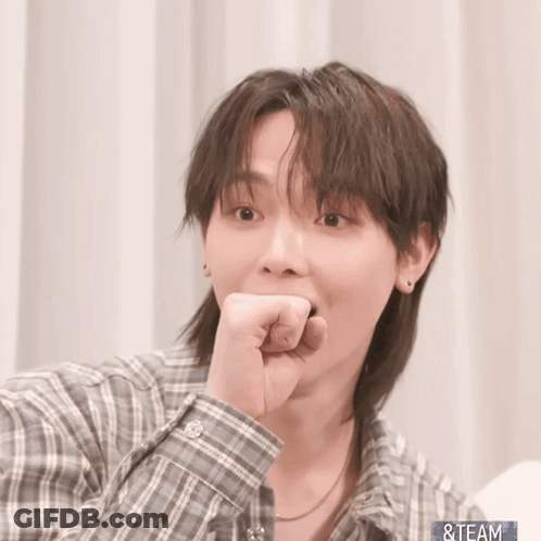 A Man Wearing A Plaid Shirt Has His Hand On His Chin And The Word Team Is On The Bottom Right GIF