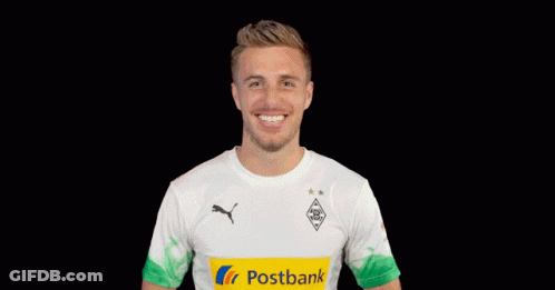 A Man Wearing A Postbank Shirt Making A Heart Shape With His Hands GIF