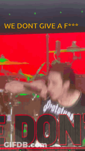 A Man Wearing A Prototypes Jersey Is Singing Into A Microphone . GIF