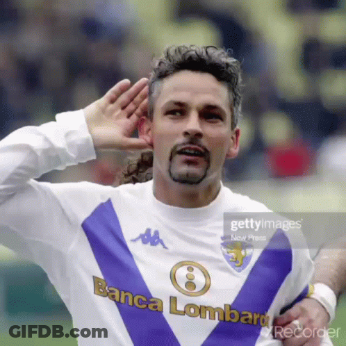 A Man Wearing A Purple And White Jersey That Says Banca Lombard GIF