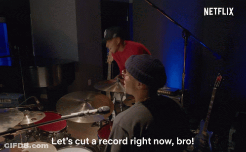 A Man Wearing A Purple Beanie And Sunglasses Says " Let 'S Cut A Record Right Now Bro " GIF