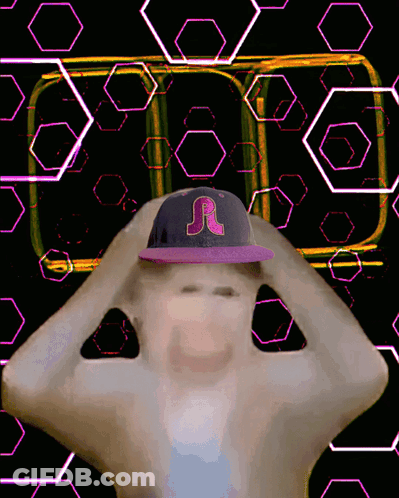 A Man Wearing A Purple Hat With A Letter R On It GIF
