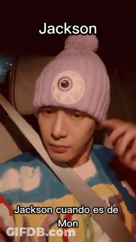 A Man Wearing A Purple Hat With An Eye On It And The Name Jackson On The Bottom GIF