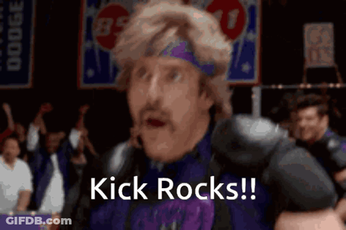 A Man Wearing A Purple Headband And A Black Jacket Says Kick Rocks GIF